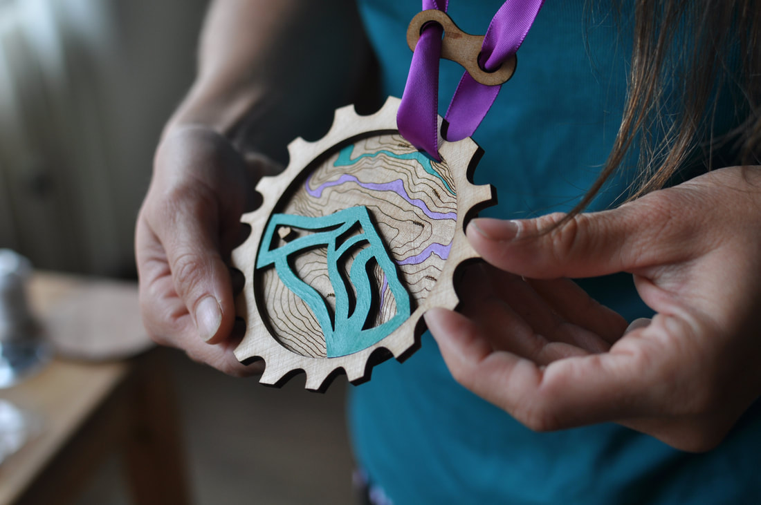 Detail of Medal for winner of Women Enduro Race bike series in Revelstoke
